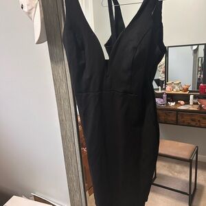 Elegant deep plunge Black Dress